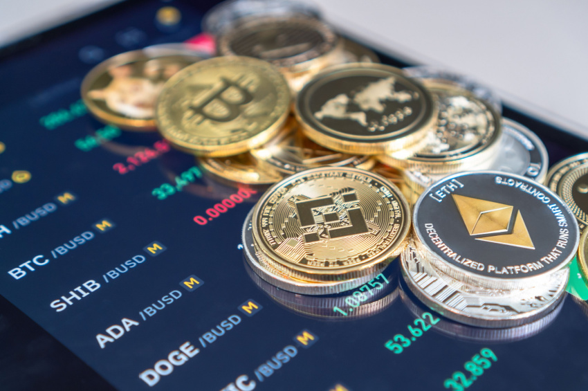 Vector illustration of a pile of bitcoin coins with a background of stock status in smartphone