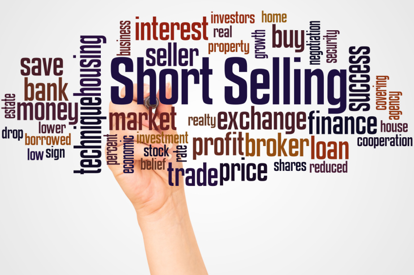 Short Selling word cloud with hand writing on white background illustrates the concept of legal issues in Short Selling.