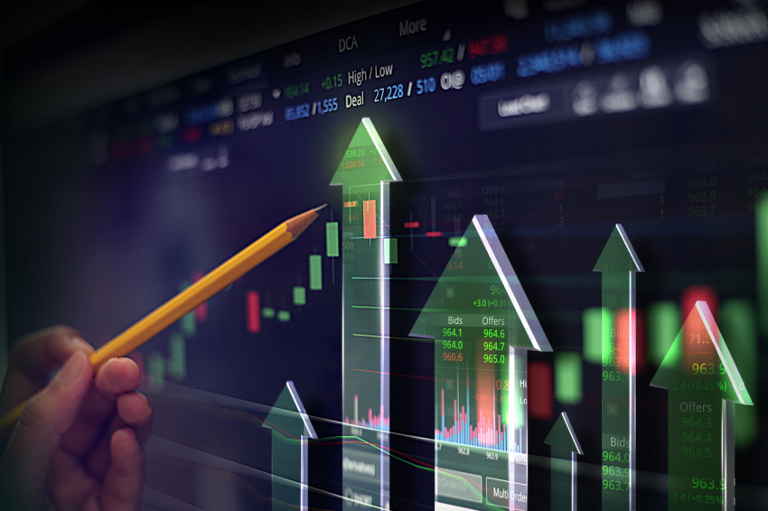 A double exposure image of the stock market rise chart with stock rates illustrates Sustainable Trade Finance.