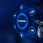 A robotic arm touching a trading button illustrates trade finance automation.